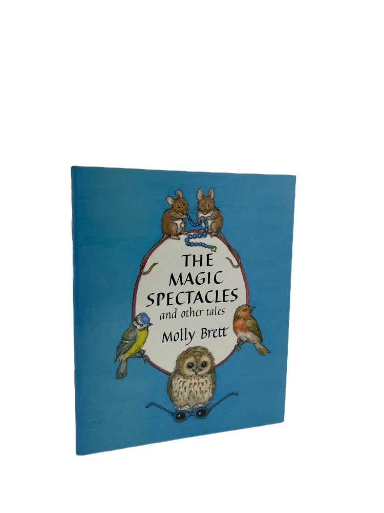 Brett, Molly - The Magic Spectacles and Other Tales | front of book. Published by The Medici Society in 1987. Paperback.  Condition:  Fine/No Jacket ( as Issued )