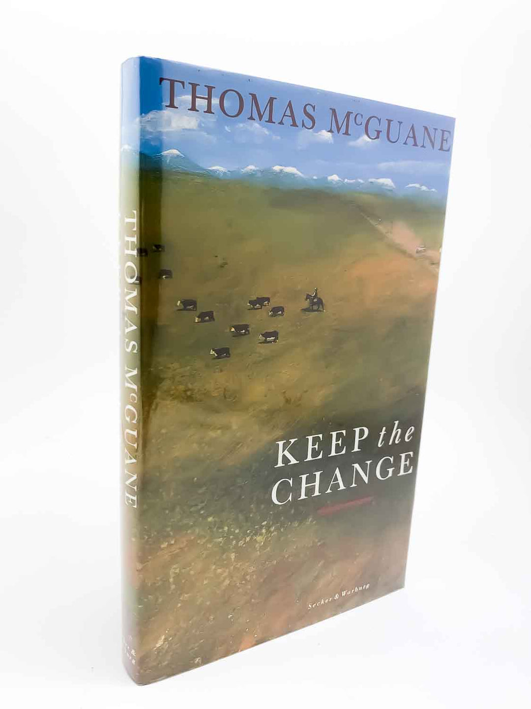 Thomas McGuane First Edition | Keep the Change SIGNED . Published by Secker & Warburg in 1990. Hardcover.  Condition:  Near Fine ++/Fine
