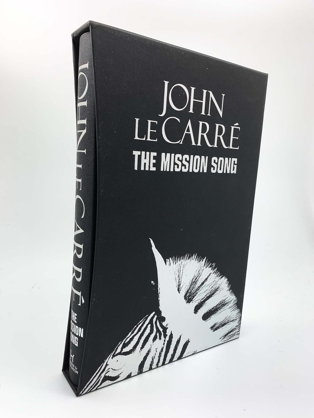 Le Carre, John - The Mission Song - SIGNED | front cover. Published by Hodder & Stoughton in 2006. Hard Cover In Slipcase.  Condition:  Fine/No Jacket ( as Issued )