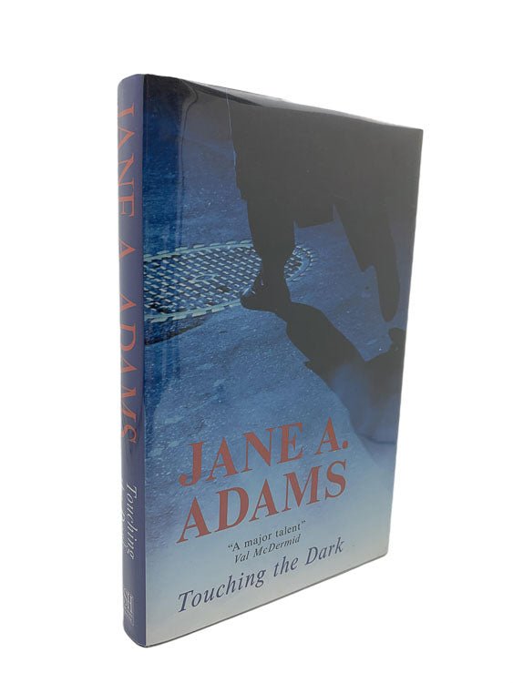 Adams, Jane - Touching the Dark | front cover. Published by Severn House in 2003. Hardcover.  Condition:  Fine/Fine