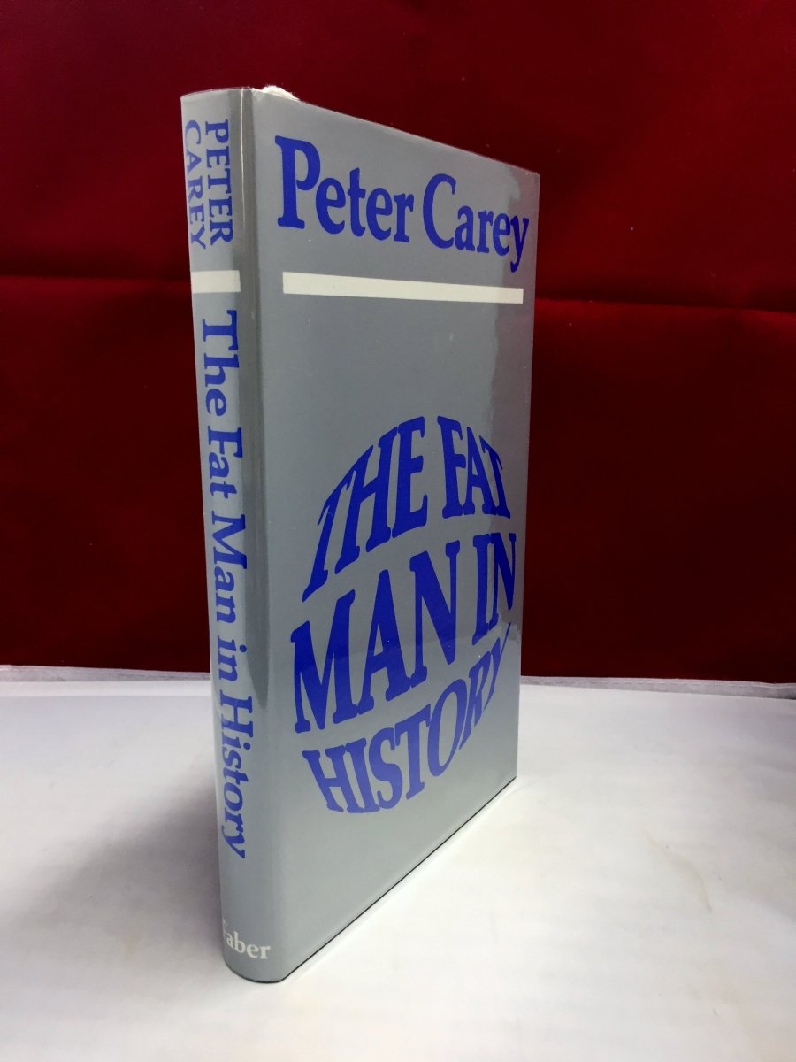 Carey, Peter - The Fat Man in History | front cover. Published by Faber & Faber Limited in 1980. Hardcover.  Condition:  Near Fine +/Near Fine +