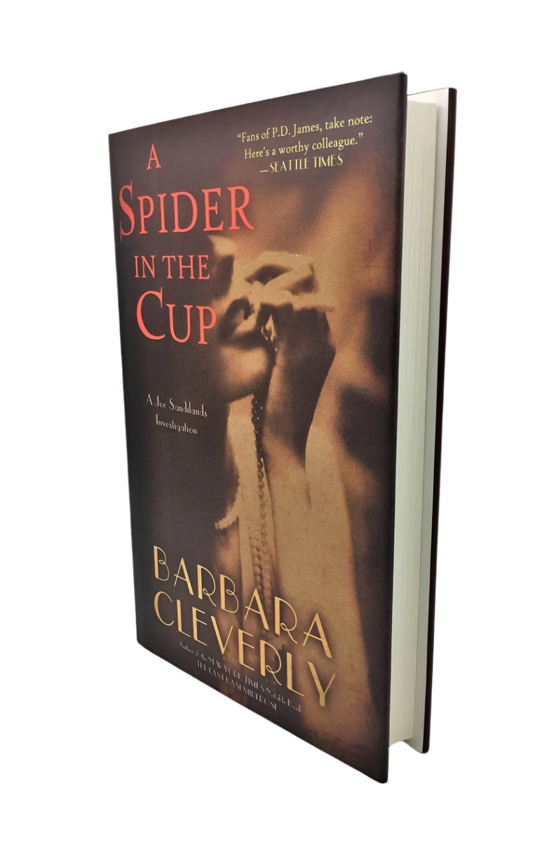 Cleverly, Barbara - A Spider in the Cup | front cover. Published by Soho in 2013. Hardcover.  Condition:  Fine/Fine