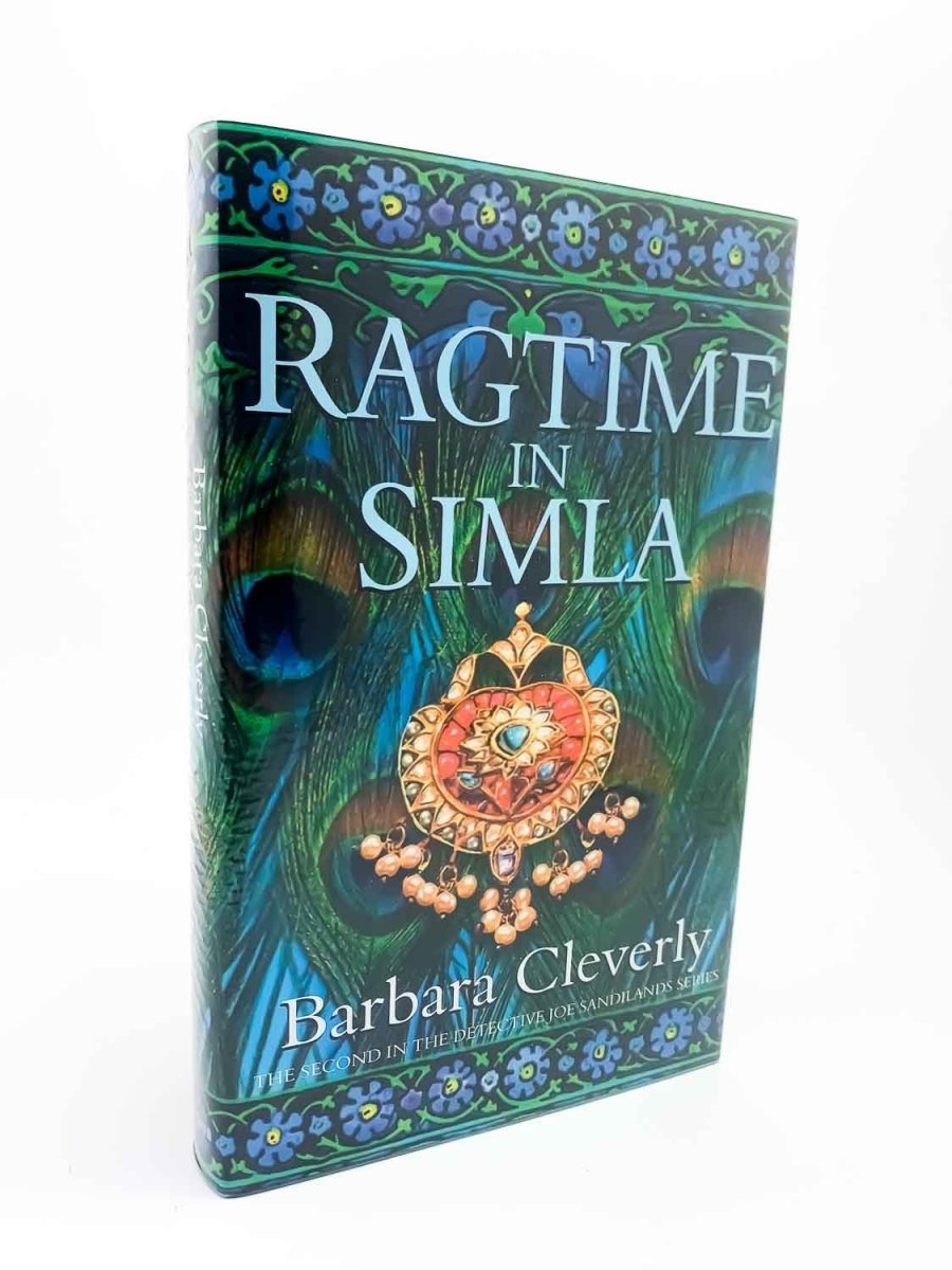 Cleverly, Barbara - Ragtime in Simla - Signed | front cover. Published by Constable in 2002. Hardcover.  Condition:  Fine/Fine