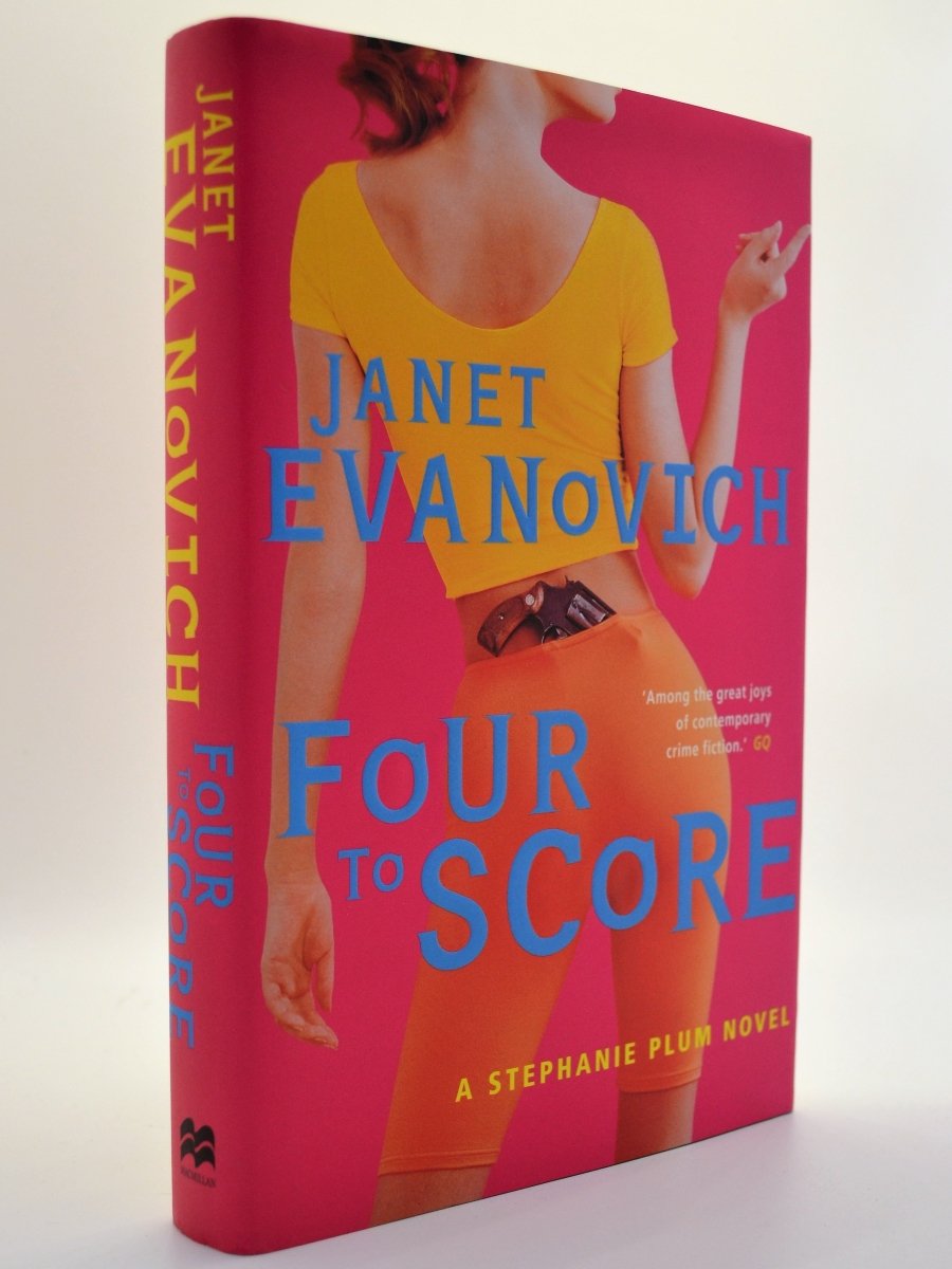 Evanovich, Janet - Four to Score | front cover. Published by Macmillan in 1998. Hardcover.  Condition:  Near Fine/Near Fine +