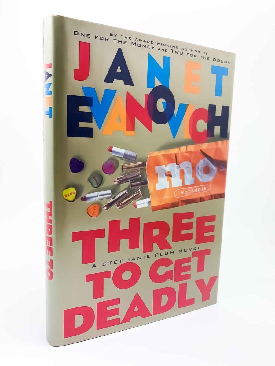 Evanovich, Janet - Three to Get Deadly | front cover. Published by Scribner in 1997. Hardcover.  Condition:  Fine/Fine