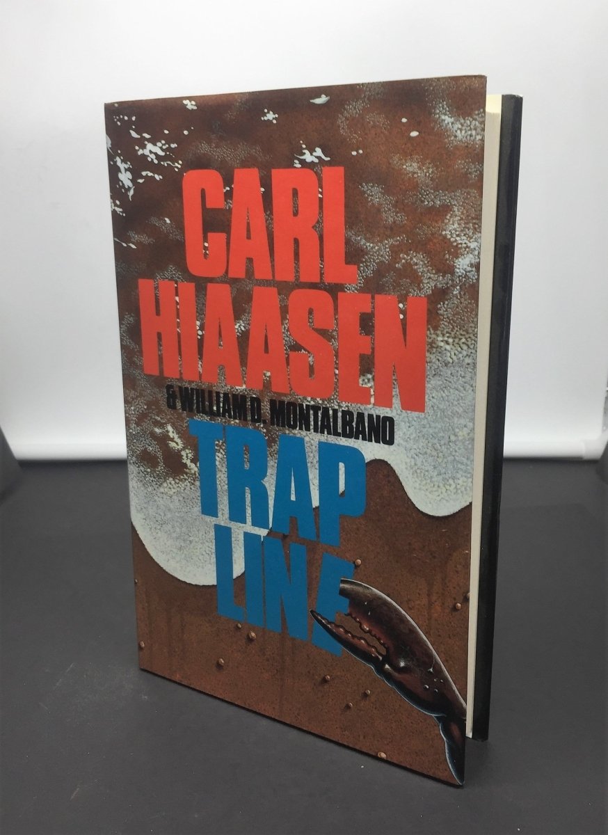 Hiaasen, Carl - Trap Line | front cover. Published by Severn House in 1993. Hardcover.  Condition:  Near Fine/Near Fine