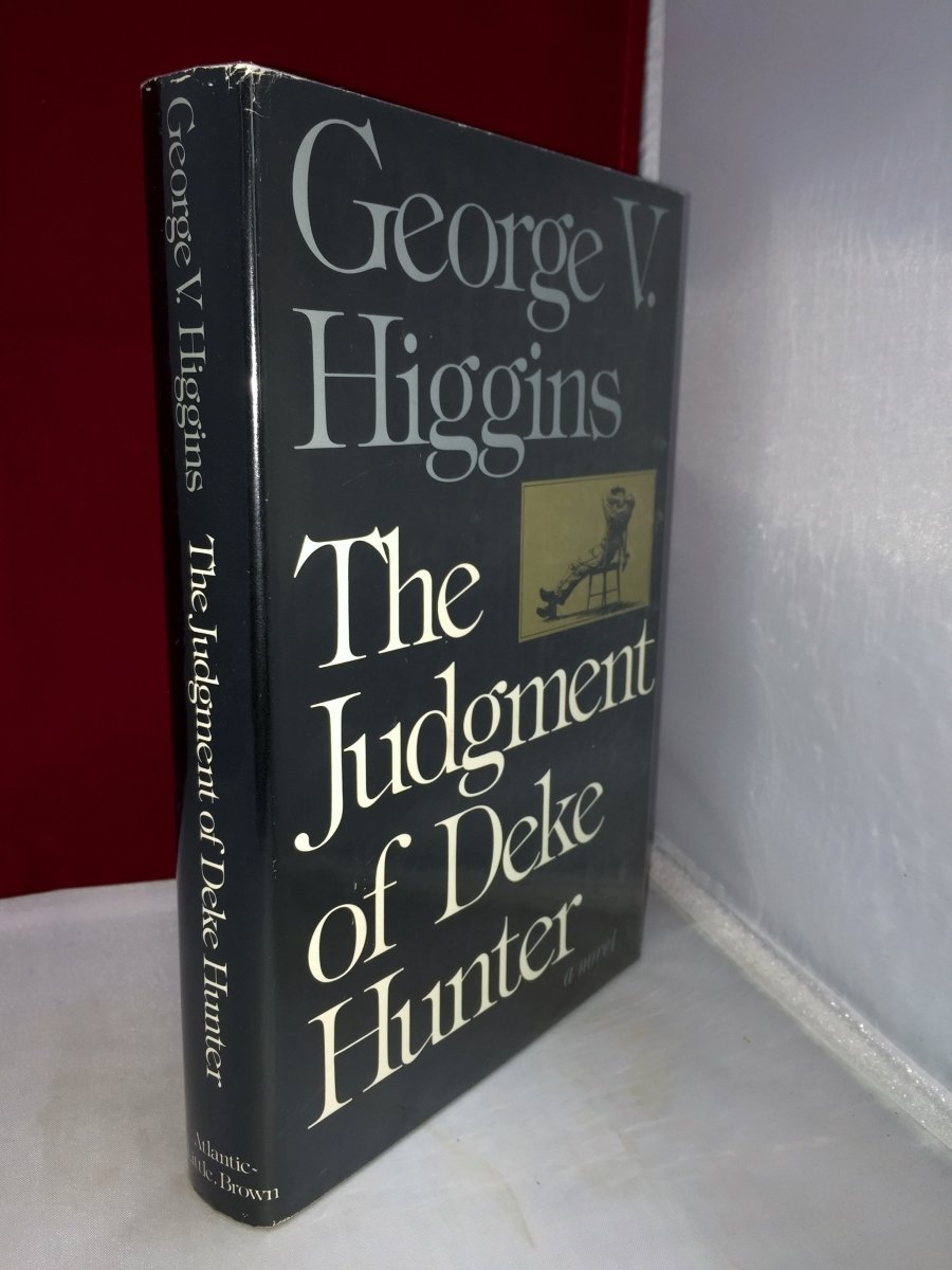 Higgins, George V - The Judgment of Deke Hunter | front cover. Published by Atlantic Monthly Press in 1976. Hardcover.  Condition:  Near Fine ++/Near Fine
