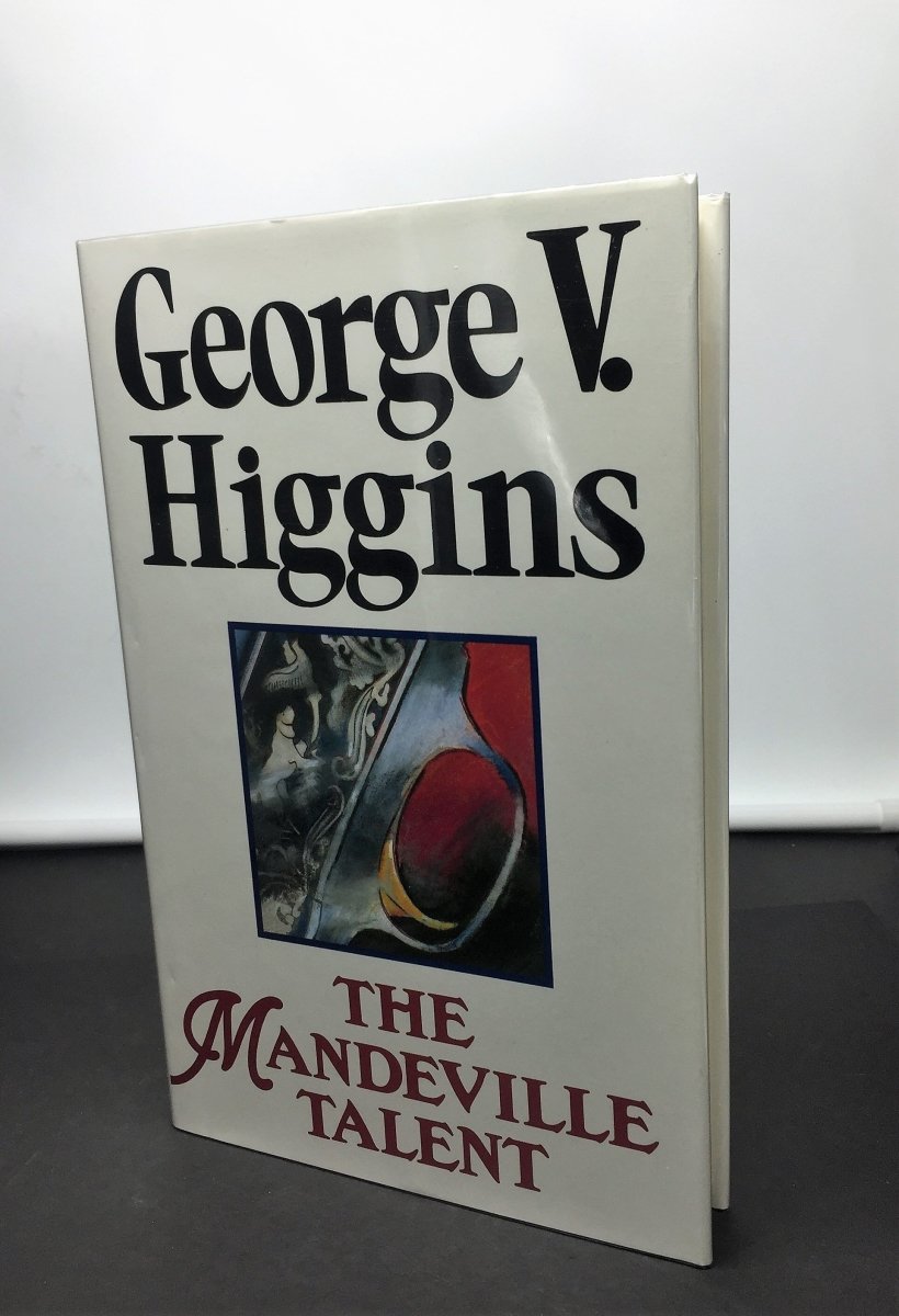 Higgins, George V - The Mandeville Talent | front cover. Published by Andre Deutsch in 1991. Hardcover.  Condition:  Near Fine ++/Fine