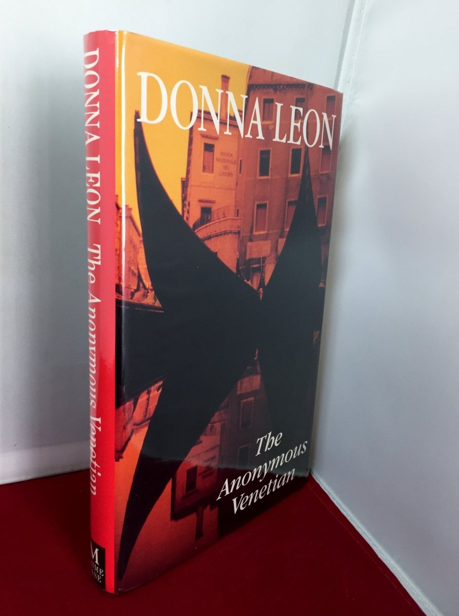 Leon, Donna - The Anonymous Venetian | front cover. Published by Macmillan in 1994. Hardcover.  Condition:  Near Fine +/Fine