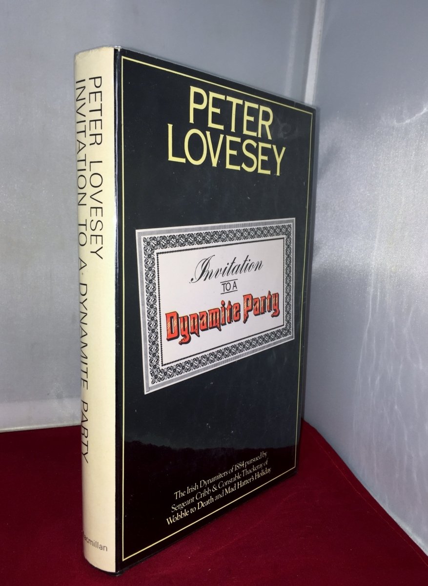 Lovesey, Peter - Invitation to a Dynamite Party | front cover. Published by Macmillan in 1974. Hardcover.  Condition:  Near Fine/Near Fine
