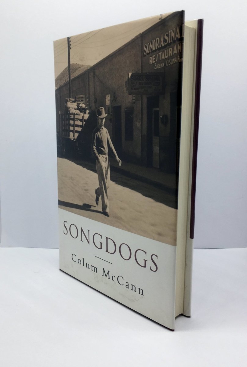 McCann, Colum - Songdogs | front cover. Published by Phoenix House in 1995. Hardcover.  Condition:  Near Fine +/Fine