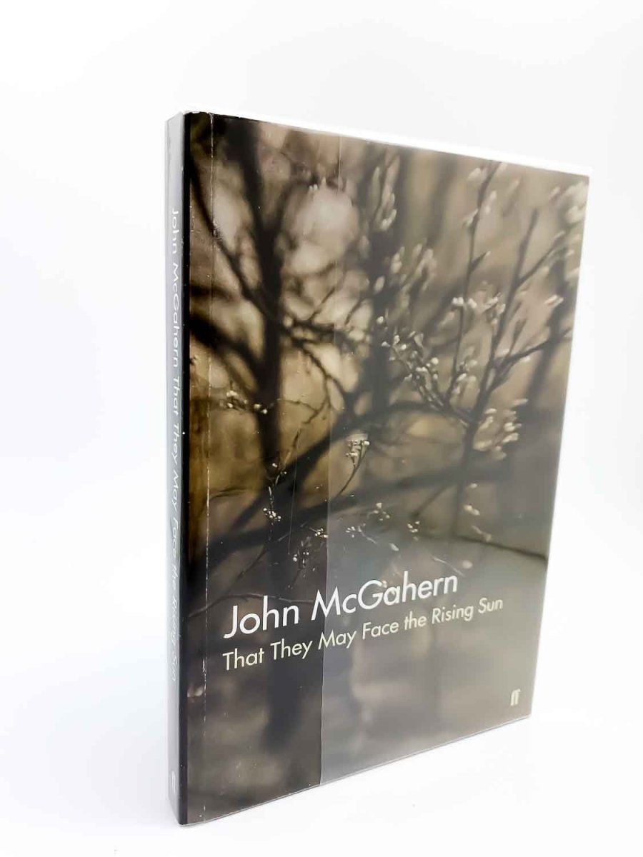 McGahern, John - That They May Face the Rising Sun | front cover. Published by Faber & Faber Limited in 2002. Paperback.  Condition:  Fine/No Jacket ( as Issued )