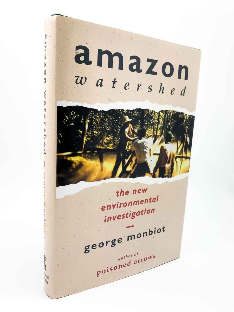 Monbiot, George - Amazon Watershed : The New Environmental Investigation | front cover. Published by Michael Joseph in 1991. Hardcover.  Condition:  Near Fine +/Near Fine +