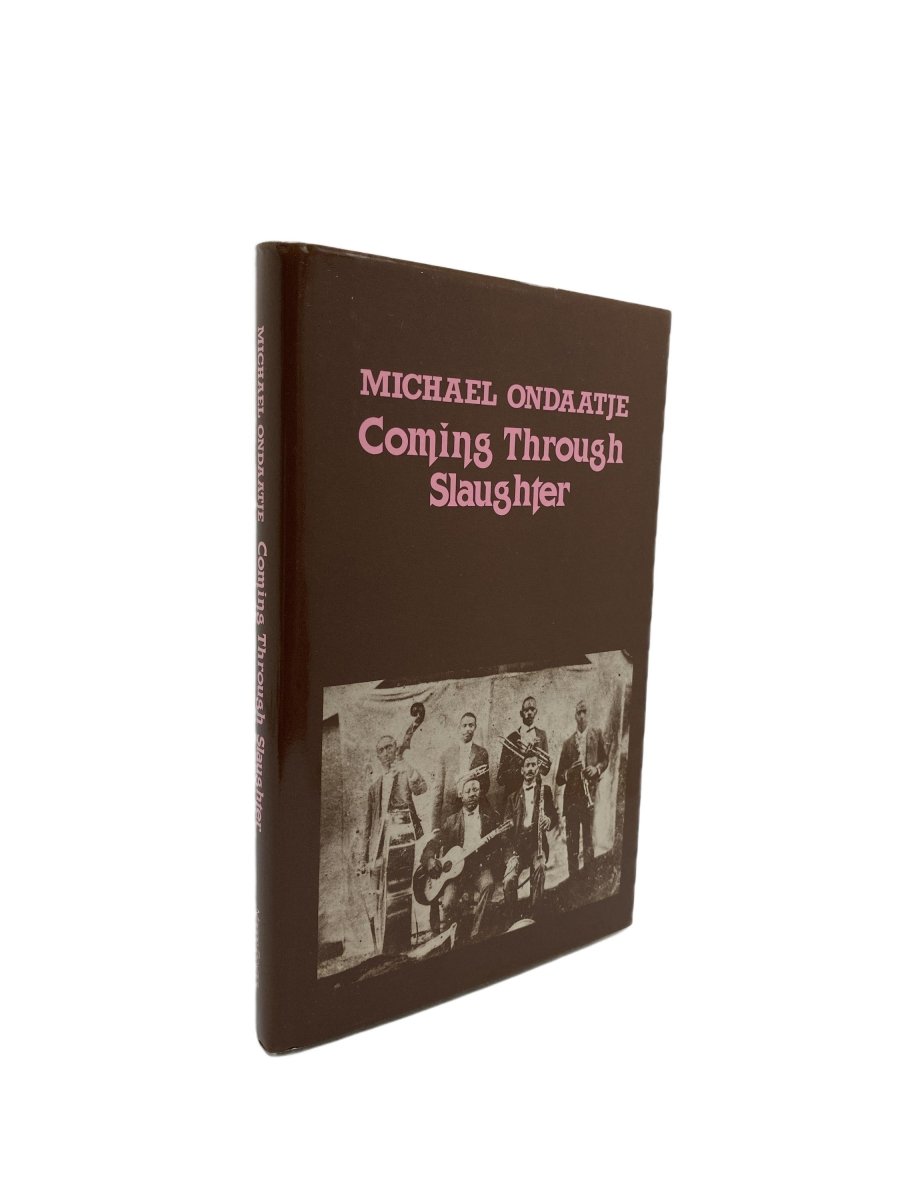 Ondaatje, Michael - Coming Through the Slaughter - SIGNED | front cover. Published by Marion Boyars in 1979. Hardcover.  Condition:  Fine/Near Fine