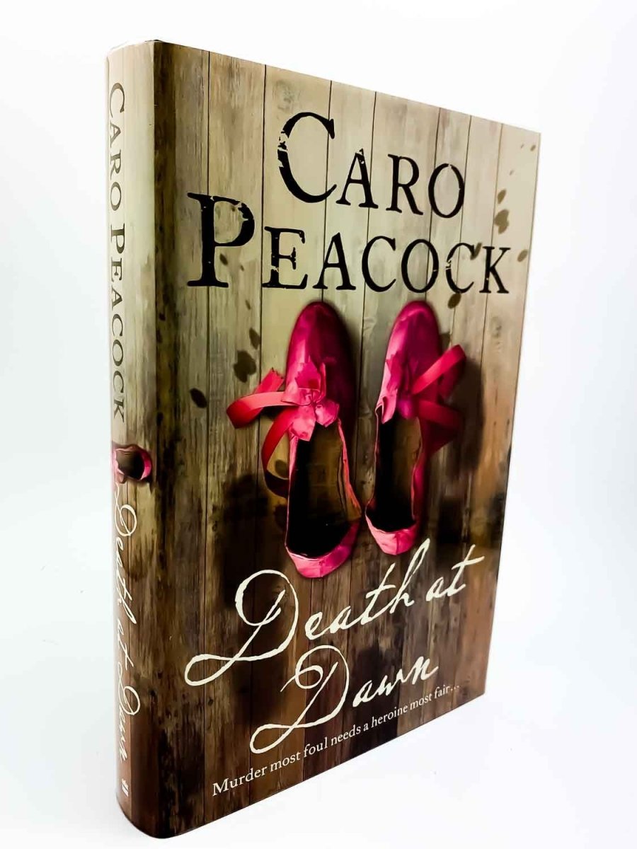 Peacock, Caro - Death at Dawn - SIGNED | front cover. Published by Harper Collins in 2007. Hardcover.  Condition:  Fine/Fine