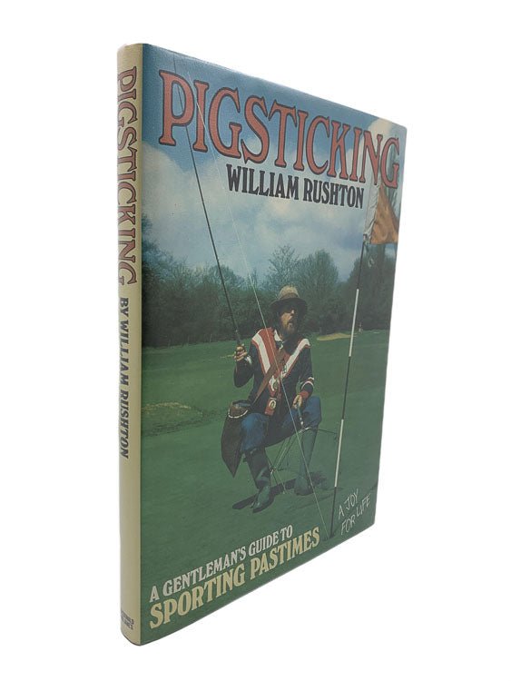 William Rushton SIGNED First Edition | Pigsticking - With Full Page Self Portrait | Cheltenham Rare Books. Published by Macdonald and Jane's in 1977. Hardcover.  Condition:  Very Good ++/Near Fine