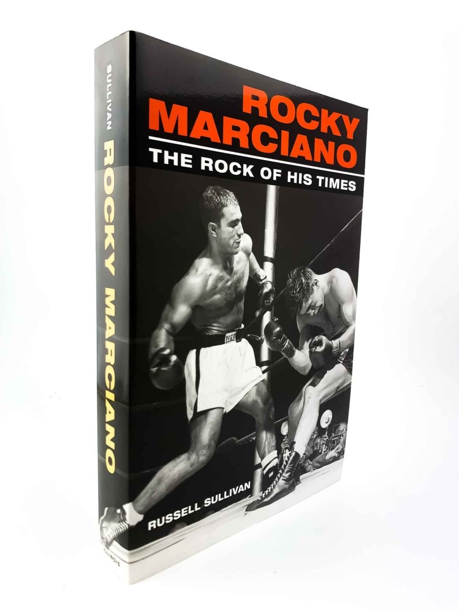 Sullivan, Russell - Rocky Marciano : The Rock of His Times | front cover. Published by University of Illinois  Press  in 2005. Paperback.  Condition:  Fine/No Jacket ( as Issued )