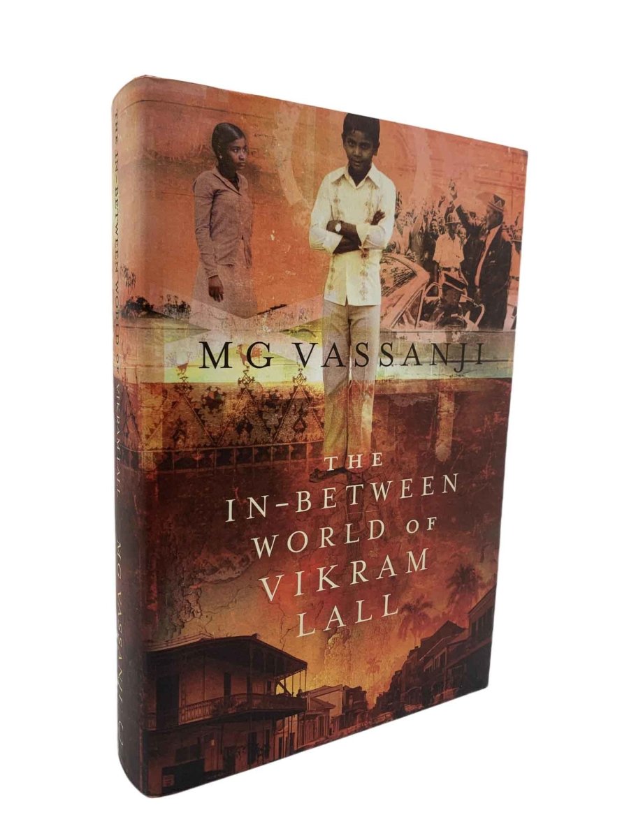 M G Vassanji First Edition | The In-Between World Of Vikram Lall | Cheltenham Rare Books. Published by Canongate in 2004. Hardcover.  Condition:  Fine/Fine