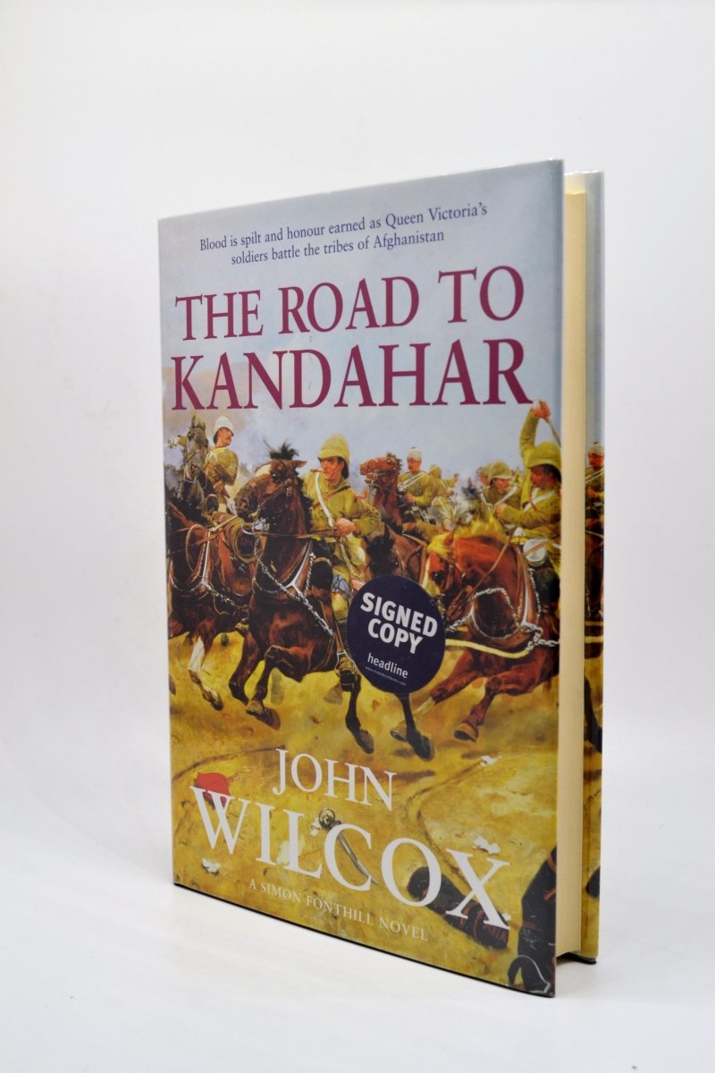 Wilcox, John - The Road to Kandahar | front cover. Published by Headline Publishing Group in 2005. Hardcover.  Condition:  Very Good ++/Fine