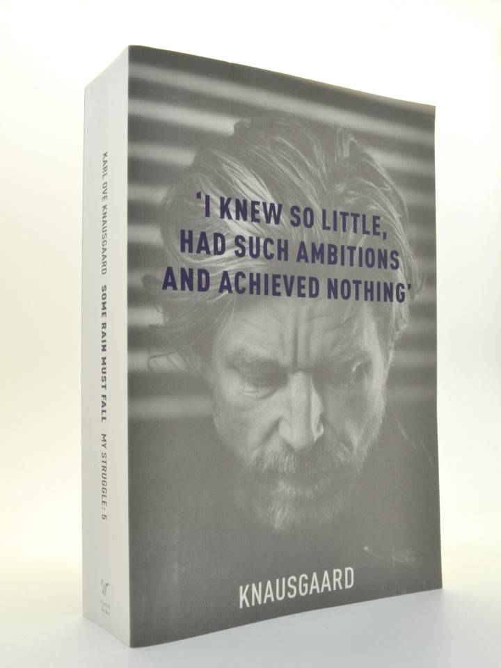 Knausgaard, Karl Ove - Some Rain Must Fall | front cover. Published by Harvill Secker in 2012. Paperback.  Condition:  Very Good ++ / Near Fine/No Jacket ( as Issued )