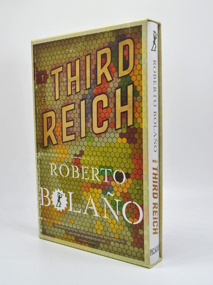 Bolano, Roberto - The Third Reich | front cover. Published by Picador in 2011. Hard Cover In Slipcase.  Condition:  Fine/Fine