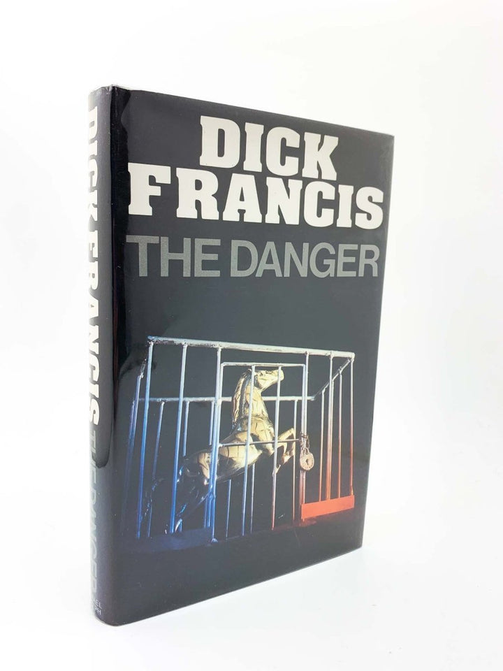 Francis, Dick - The Danger - SIGNED | front cover. Published by Michael Joseph in 1983. Hardcover.  Condition:  Near Fine/Near Fine