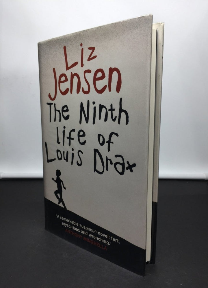 Jensen, Liz - The Ninth Life of Louis Drax | front cover. Published by Bloomsbury in 2004. Hardcover.  Condition:  Near Fine ++/Near Fine ++