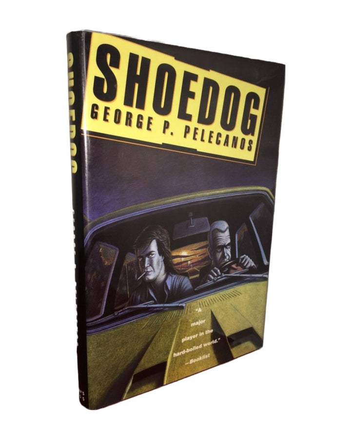 Pelecanos, George - Shoedog - SIGNED | front cover. Published by St Martin's Press in 1994. Hardcover.  Condition:  Fine/Near Fine