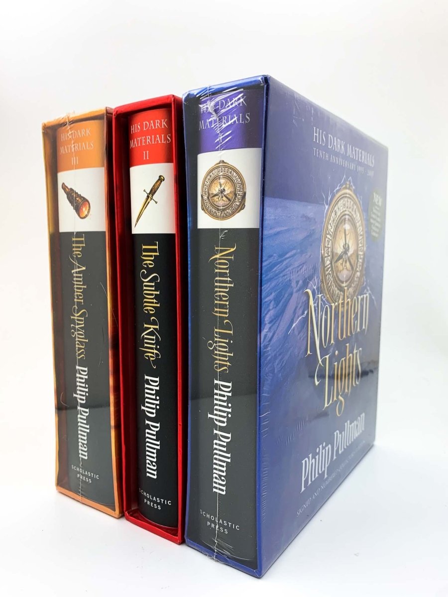 Pullman, Philip - His Dark Materials : Northern Lights, The Subtle Knife, The Amber Spyglass - Tenth anniversary SIGNED SLIPCASED Collector's Edition. - SIGNED | front cover