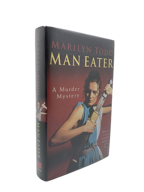 Todd, Marilyn - Man Eater | front cover. Published by Macmillan in 1997. Hardcover.  Condition:  Fine/Fine